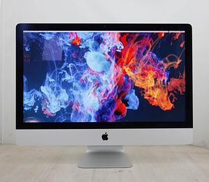 The iMac \"Core i5\" 3.3 27-Inch Aluminum (Mid-2015/Retina 5K) features a 22 nm \"Haswell\" *Quad Core* 3.3 GHz Intel \"Core i5\" (4590) processor with *four* independent processor cores on a single chip, a 6 MB shared level 3 cache, 16GB of 1600 MHz DDR3L SDRAM (PC3-12800) installed in pairs (two 4 GB modules), a 2 Tbytes 7200 RPM hard drive, and a AMD Radeon R9 M290 graphics processor with 2 GB of dedicated GDDR5 memory. It also has a built-in \"FaceTime HD\" webcam and stereo speakers. This model has a 27\" *5120x2880* LED-backlit 16:9 widescreen IPS display that Apple has dubbed \"Retina 5K\". The rear of the case is aluminum and is thicker in the middle and tapers to a razor thin 5 mm at the edges.  
Connectivity includes four USB 3.0 ports, dual Thunderbolt 2 ports, Gigabit Ethernet, 802.11ac Wi-Fi (802.11a/b/g/n backwards compatible), and Bluetooth 4.0.