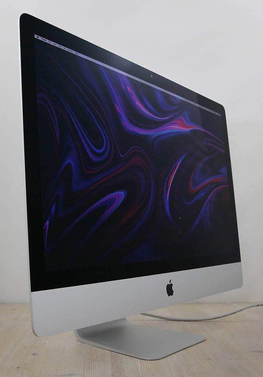 The iMac Core i9 3.6 27-Inch Aluminum (Retina 5K, 2020/Comet Lake; AMD Radeon Pro 5700 8gb) features a 14-nm Comet Lake 3.6GHz Intel Core i9 processor (I9-10910) with *ten* independent processor cores on a single chip, a 20 MB shared level 3 cache, a T2 Security Chip, 64GB of *easy to upgrade* 2666 MHz DDR4 SDRAM, a 1Tbytes SSD, and a Radeon Pro 5700 graphics processor wth 8 GB of dedicated GDDR6 video memory. It also has a built-in 1080p FaceTime HD webcam, a studio-quality three-mic array, and stereo speakers. This model has a 27\" *5120x2880* LED-backlit 16:9 widescreen IPS DCI-P3 Retina 5K display with True Tone technology. The rear of the case is aluminum and is thicker in the middle and tapers to a razor thin 5 mm at the edges. Connectivity includes four USB 3.0 ports, dual Thunderbolt 3 (USB-C) ports, Gigabit Ethernet, 802.11ac Wi-Fi, and Bluetooth 5.0.