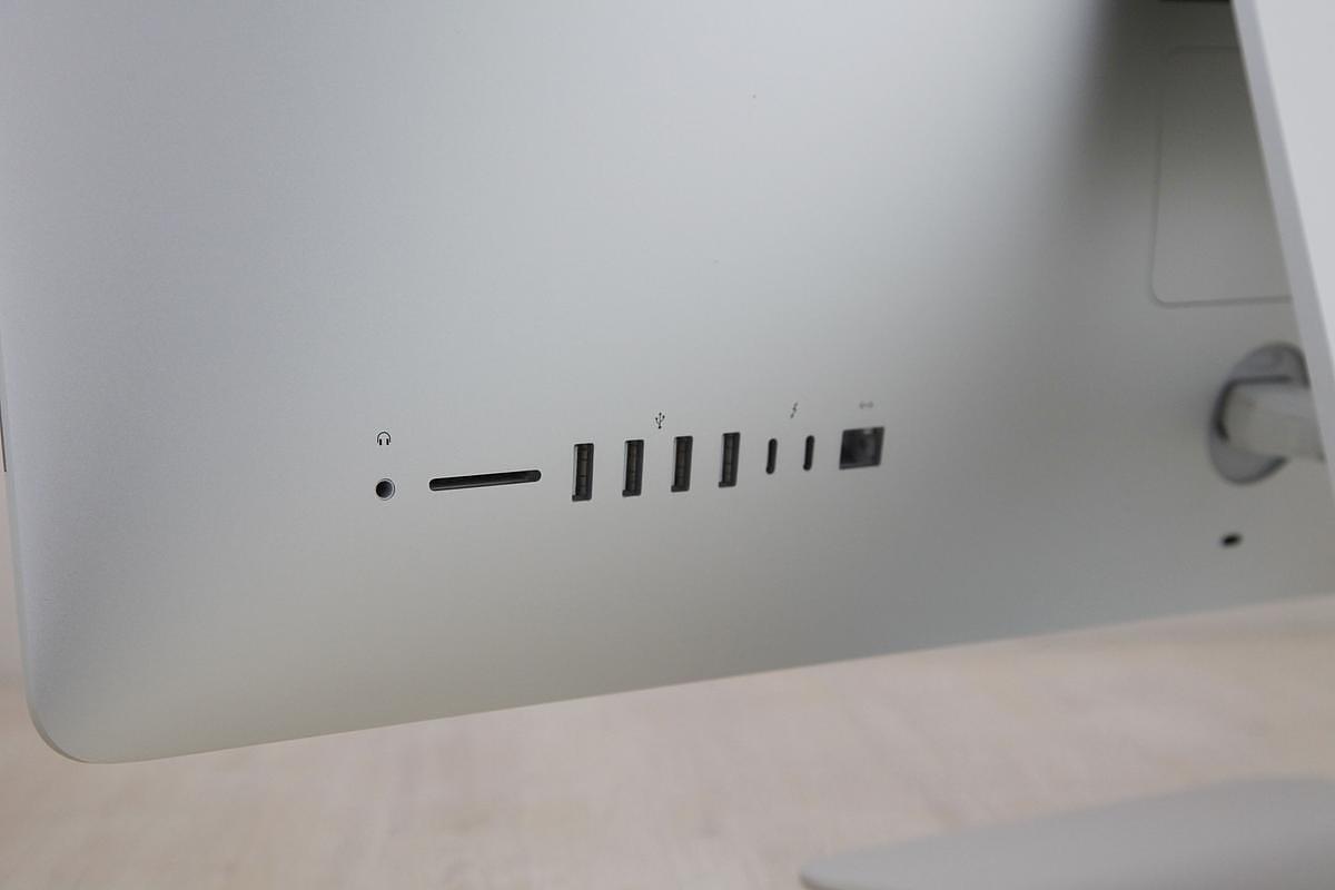 The iMac Core i9 3.6 27-Inch Aluminum (Retina 5K, 2020/Comet Lake; AMD Radeon Pro 5700 8gb) features a 14-nm Comet Lake 3.6GHz Intel Core i9 processor (I9-10910) with *ten* independent processor cores on a single chip, a 20 MB shared level 3 cache, a T2 Security Chip, 64GB of *easy to upgrade* 2666 MHz DDR4 SDRAM, a 512Gb SSD, and a Radeon Pro 5700 graphics processor wth 8 GB of dedicated GDDR6 video memory. It also has a built-in 1080p FaceTime HD webcam, a studio-quality three-mic array, and stereo speakers. This model has a 27\" *5120x2880* LED-backlit 16:9 widescreen IPS DCI-P3 Retina 5K display with True Tone technology. The rear of the case is aluminum and is thicker in the middle and tapers to a razor thin 5 mm at the edges. Connectivity includes four USB 3.0 ports, dual Thunderbolt 3 (USB-C) ports, Gigabit Ethernet, 802.11ac Wi-Fi, and Bluetooth 5.0.