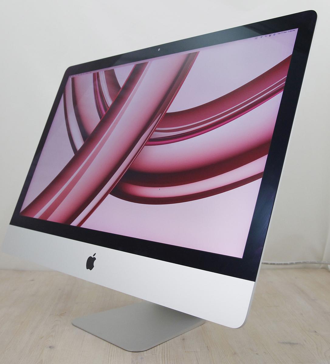 The iMac Core i9 3.6 27-Inch Aluminum (Retina 5K, 2020/Comet Lake; AMD Radeon Pro 5700 8gb) features a 14-nm Comet Lake 3.6GHz Intel Core i9 processor (I9-10910) with *ten* independent processor cores on a single chip, a 20 MB shared level 3 cache, a T2 Security Chip, 64GB of *easy to upgrade* 2666 MHz DDR4 SDRAM, a 512Gb SSD, and a Radeon Pro 5700 graphics processor wth 8 GB of dedicated GDDR6 video memory. It also has a built-in 1080p FaceTime HD webcam, a studio-quality three-mic array, and stereo speakers. This model has a 27\" *5120x2880* LED-backlit 16:9 widescreen IPS DCI-P3 Retina 5K display with True Tone technology. The rear of the case is aluminum and is thicker in the middle and tapers to a razor thin 5 mm at the edges. Connectivity includes four USB 3.0 ports, dual Thunderbolt 3 (USB-C) ports, Gigabit Ethernet, 802.11ac Wi-Fi, and Bluetooth 5.0.