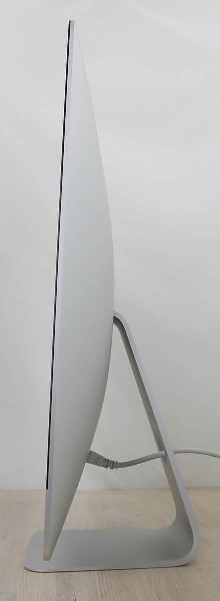 The iMac Core i9 3.6 27-Inch Aluminum (Retina 5K, 2020/Comet Lake; AMD Radeon Pro 5700 8gb) features a 14-nm Comet Lake 3.6GHz Intel Core i9 processor (I9-10910) with *ten* independent processor cores on a single chip, a 20 MB shared level 3 cache, a T2 Security Chip, 64GB of *easy to upgrade* 2666 MHz DDR4 SDRAM, a 1Tbytes SSD, and a Radeon Pro 5700 graphics processor wth 8 GB of dedicated GDDR6 video memory. It also has a built-in 1080p FaceTime HD webcam, a studio-quality three-mic array, and stereo speakers. This model has a 27\" *5120x2880* LED-backlit 16:9 widescreen IPS DCI-P3 Retina 5K display with True Tone technology. The rear of the case is aluminum and is thicker in the middle and tapers to a razor thin 5 mm at the edges. Connectivity includes four USB 3.0 ports, dual Thunderbolt 3 (USB-C) ports, Gigabit Ethernet, 802.11ac Wi-Fi, and Bluetooth 5.0.