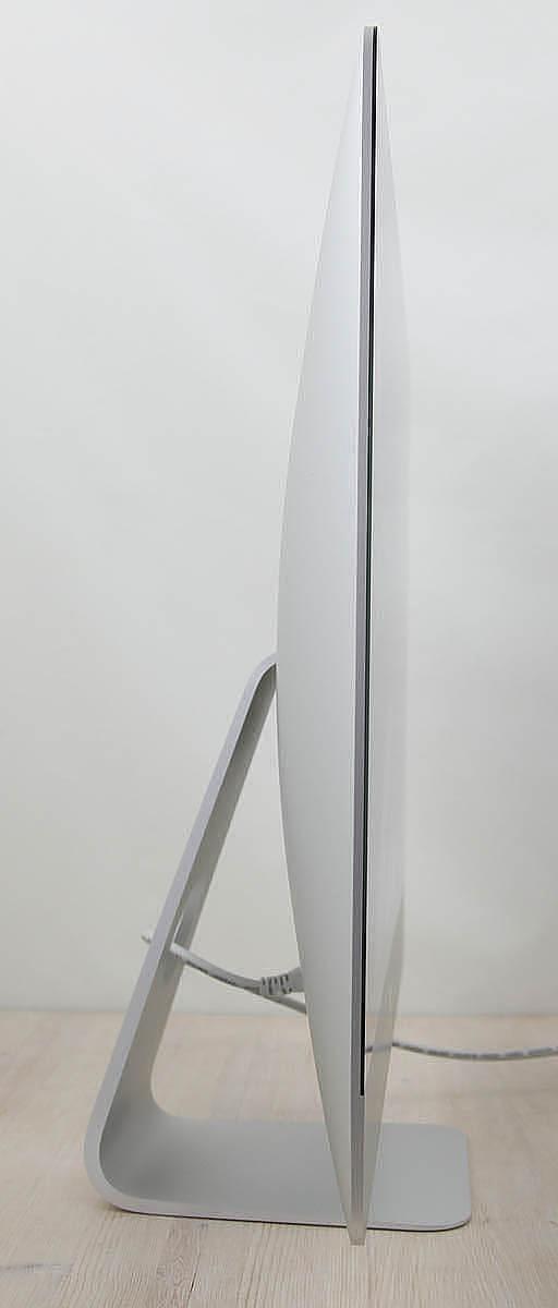 This iMac Core i5 3.0Ghz 27-Inch (Retina 5K, 2019) features a 14-nm 3.0GHz Intel Core i5 processor with 4 independent cores, 6 MB shared level 3 cache, 32GB 2666MHz DDR4 SDRAM memory, a 1Tbyte SSD, and an AMD Radeon Pro 570X graphics card with 4GB of memory. It also features a built-in FaceTime HD camera and stereo speakers. This model features a gorgeous 27-inch 5120×2880 LED-backlit 16:9 widescreen IPS DCI-P3 Retina 5K display. The display bezel is 5mm thick and is made of a solid cast aluminum chassis. Connectivity includes 4x USB 3.0 ports, 2x Thunderbolt 3 (USB-C) ports, Gigabit Ethernet port, 802.11ac Wi-Fi wireless networking capability, and of course Bluetooth 4.2.