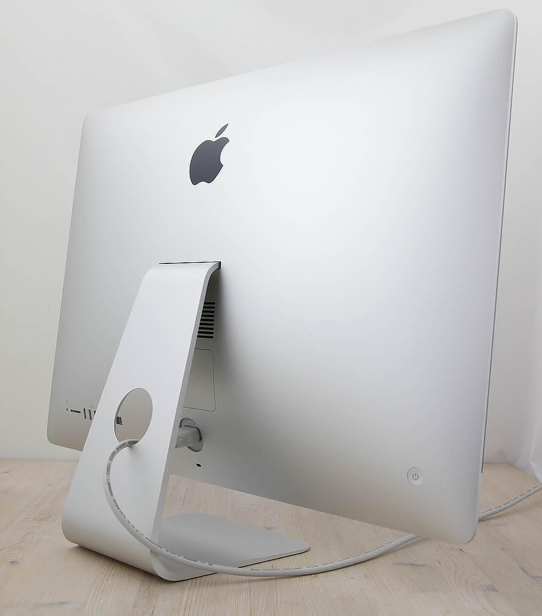 This iMac Core i5 3.0Ghz 27-Inch (Retina 5K, 2019) features a 14-nm 3.0GHz Intel Core i5 processor with 4 independent cores, 6 MB shared level 3 cache, 32GB 2666MHz DDR4 SDRAM memory, a 1Tbyte SSD, and an AMD Radeon Pro 570X graphics card with 4GB of memory. It also features a built-in FaceTime HD camera and stereo speakers. This model features a gorgeous 27-inch 5120×2880 LED-backlit 16:9 widescreen IPS DCI-P3 Retina 5K display. The display bezel is 5mm thick and is made of a solid cast aluminum chassis. Connectivity includes 4x USB 3.0 ports, 2x Thunderbolt 3 (USB-C) ports, Gigabit Ethernet port, 802.11ac Wi-Fi wireless networking capability, and of course Bluetooth 4.2.