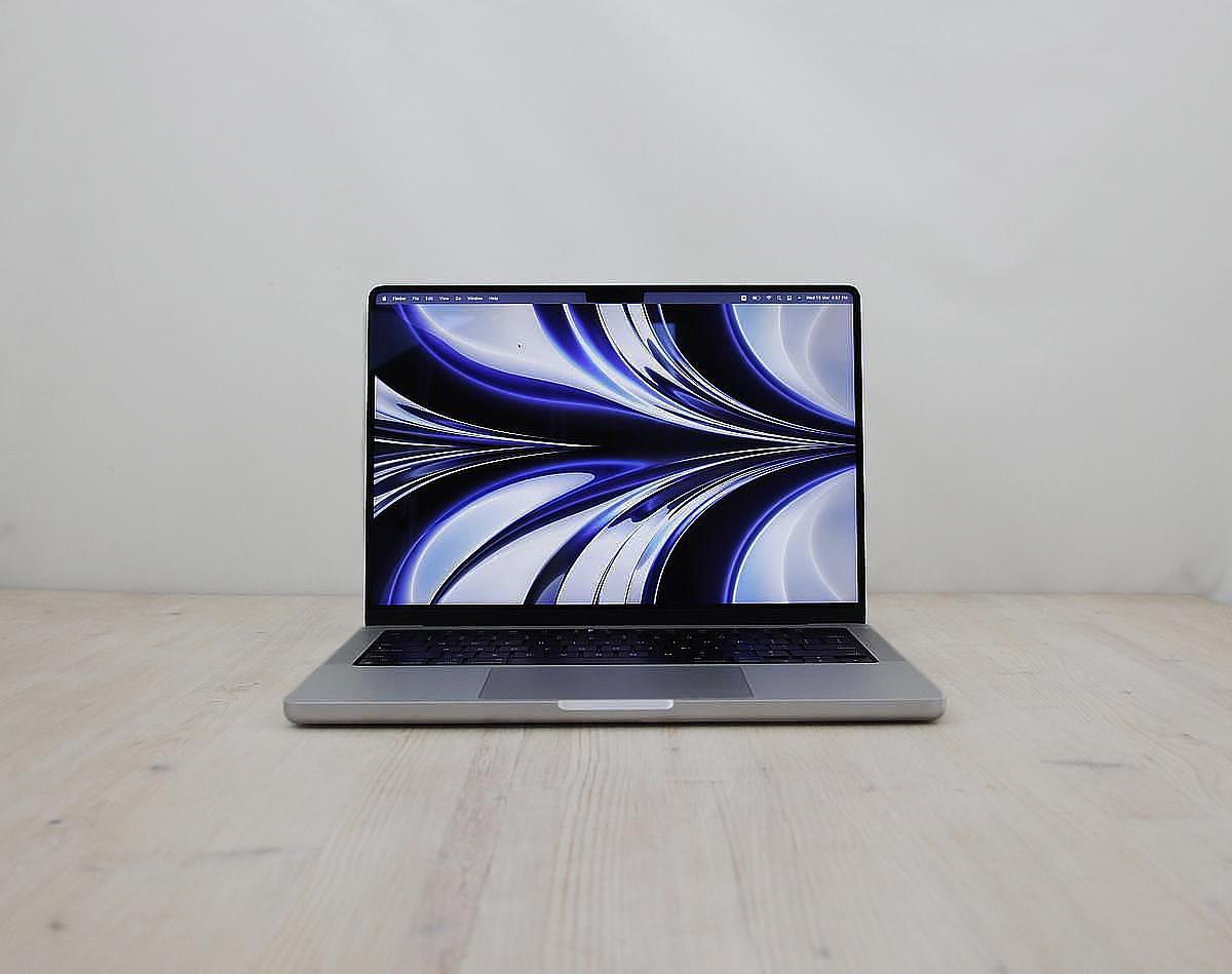 The Apple MacBook Pro \"M2 Max\" 12-Core CPU/30-Core GPU 14-Inch (2023) model features a 3.68 GHz Apple M2 Max processor with twelve cores (8 performance cores and 4 efficiency cores), a 30-core GPU, a 16-core Neural Engine, 32 GB of RAM, and a 1 TB SSD. This notebook has an integrated 1080p FaceTime HD webcam, a \"high-fidelity six-speaker sound system with force-cancelling woofers,\" a backlit \"Magic Keyboard\" with a \"Touch ID\" sensor (but no \"Touch Bar\"), and a gigantic \"Force Touch\" trackpad. Additionally, it has a high-resolution LED-backlit 14.2\" widescreen 3024x1964 (254 ppi, 1000 nits sustained, 1600 nits peak HDR, 1,000,000:1 contrast ratio) \"Liquid Retina XDR\" display. Connectivity includes Wi-Fi 6E (802.11ax), Bluetooth 5.3, three Thunderbolt 4 ports (USB-C connector), an HDMI 2.1 port, an SDXC-capable SD card slot, a 3.5 mm headphone jack, and a \"MagSafe 3\" power connector.