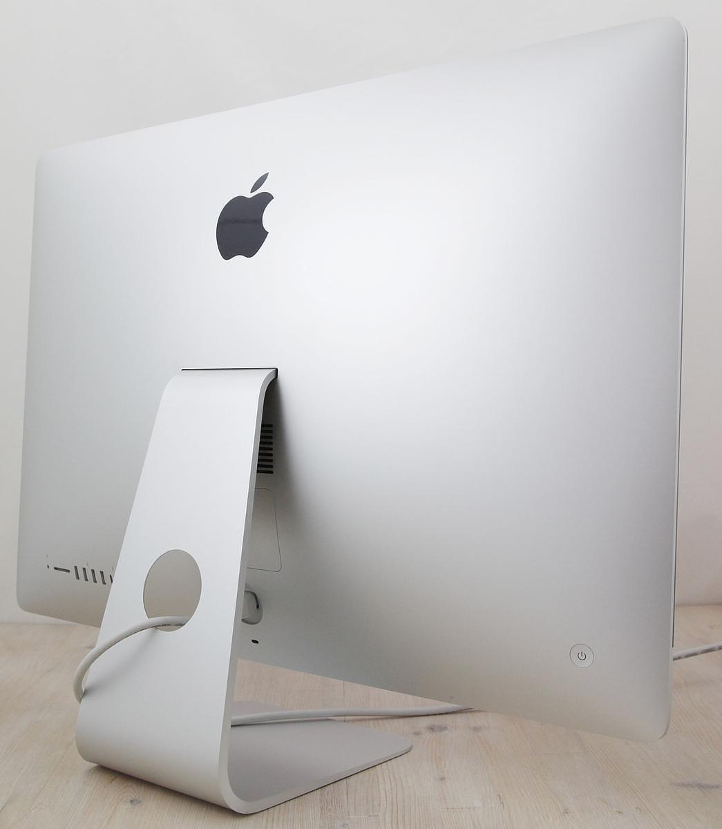 The iMac Core i9 3.6 27-Inch Aluminum (Retina 5K, 2020/Comet Lake; AMD Radeon Pro 5700 8gb) features a 14-nm Comet Lake 3.6GHz Intel Core i9 processor (I9-10910) with *ten* independent processor cores on a single chip, a 20 MB shared level 3 cache, a T2 Security Chip, 64GB of *easy to upgrade* 2666 MHz DDR4 SDRAM, a 512Gb SSD, and a Radeon Pro 5700 graphics processor wth 8 GB of dedicated GDDR6 video memory. It also has a built-in 1080p FaceTime HD webcam, a studio-quality three-mic array, and stereo speakers. This model has a 27\" *5120x2880* LED-backlit 16:9 widescreen IPS DCI-P3 Retina 5K display with True Tone technology. The rear of the case is aluminum and is thicker in the middle and tapers to a razor thin 5 mm at the edges. Connectivity includes four USB 3.0 ports, dual Thunderbolt 3 (USB-C) ports, Gigabit Ethernet, 802.11ac Wi-Fi, and Bluetooth 5.0.